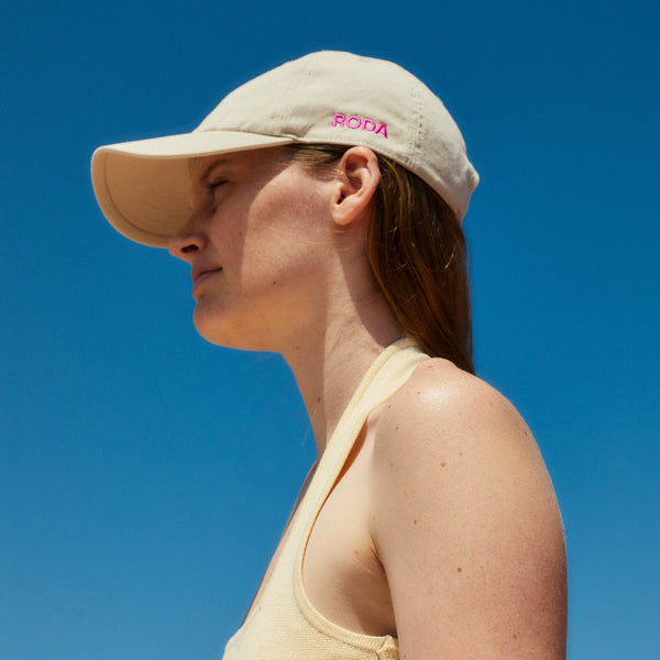Protect your skin with a RODA cap. Made of 100% Organic Cotton in Poblenou, Barcelona. Unisex. Adjustable brass buckle strap, one size fits all. 